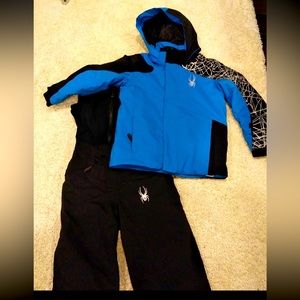 Spyder snow bib and ski jacket. Warm, excellent condition and looks great!